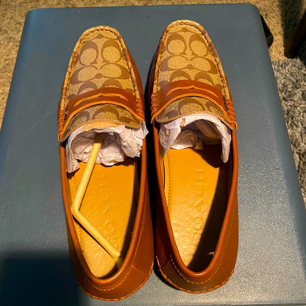 Brand New Men Size 10.5 Coach Leather
Loafers Brown
